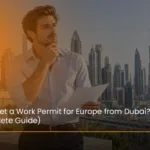 Dubai professional reviewing documents for a Europe work permit application